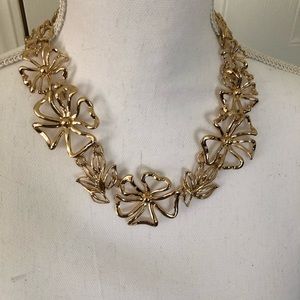 Goldtone open floral choker necklace